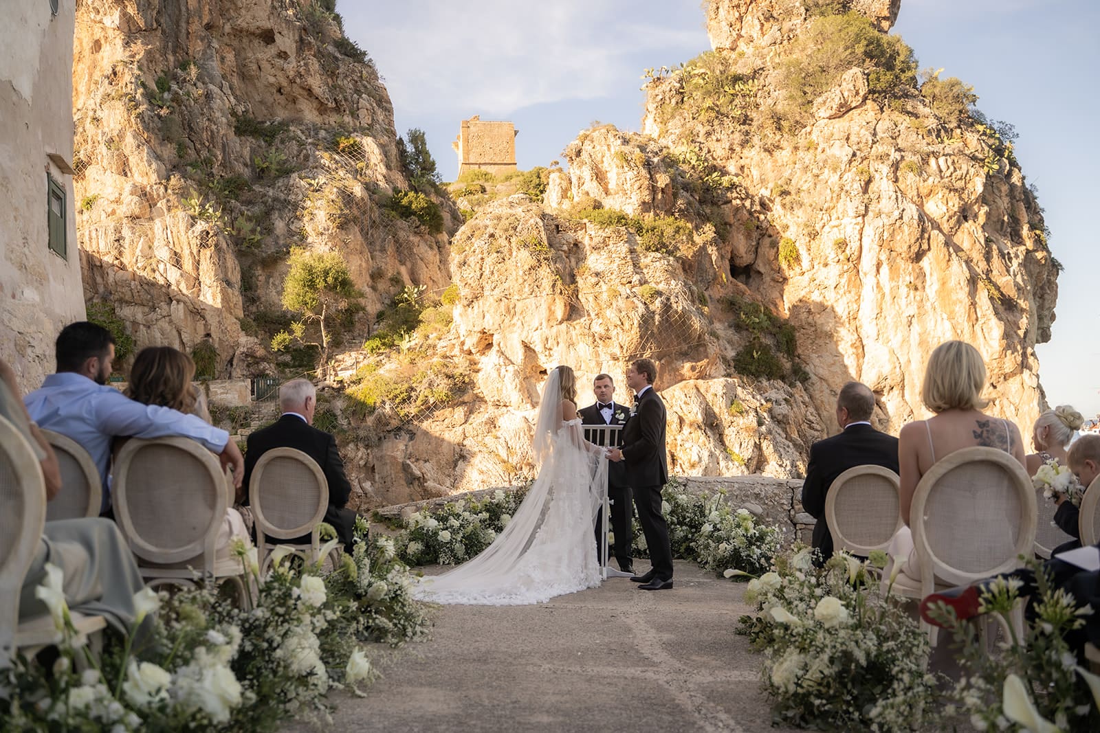 Couple exchanging vows during symbolic ceremony in Sicily