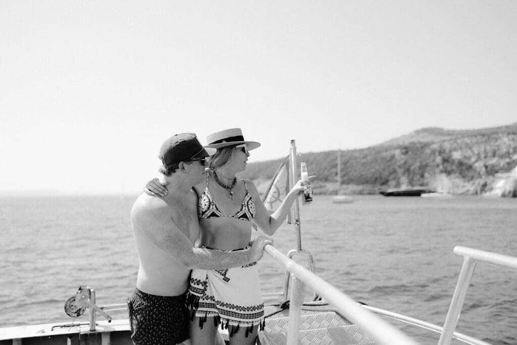 Couple enjoying a private boat experience during their destination wedding weekend in Europe.