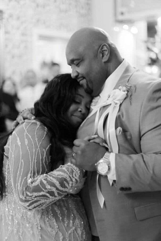 Emotional father and daughter dance during a destination wedding celebration in Italy.